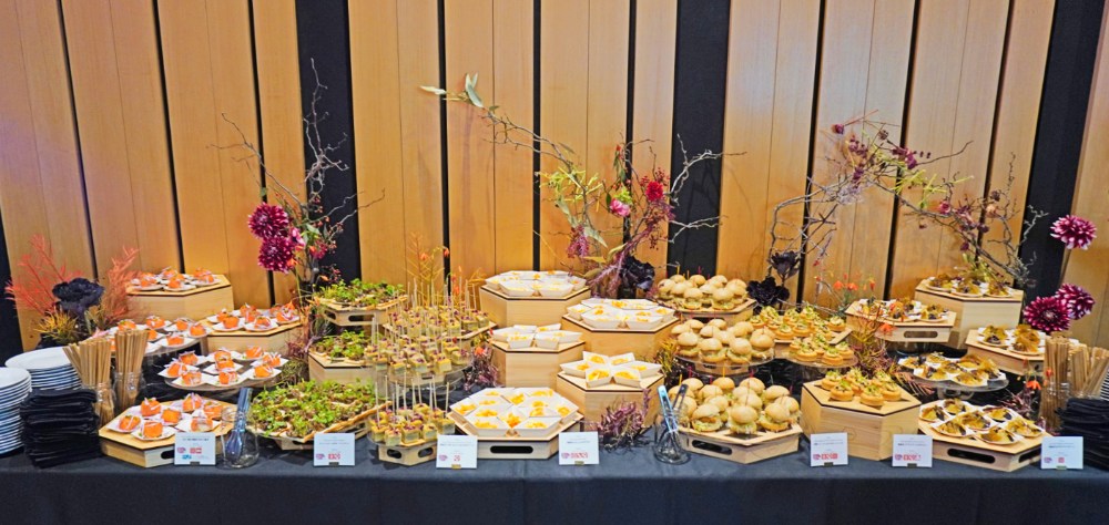 Buffet table at the Tokyo Sustainable MICE Showcase showcasing 6 out of 7 vegan options