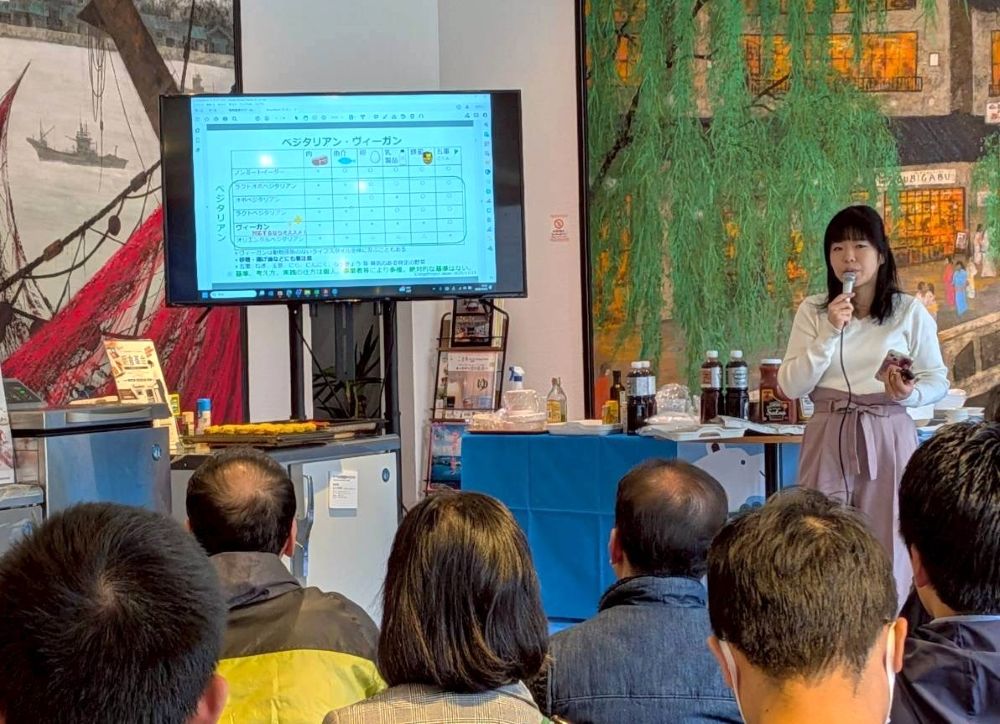 Haruko Kawano of VegeProject giving a vegetarian/vegan seminar lecture in Kinosaki Onsen