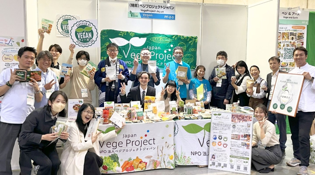 Group photo at the VegeProject Japan booth at the B2B vegan food exhibition "VEG FOOD EXPO"